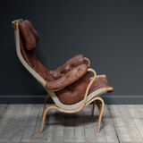 A Pernilla 69 leather lounge chair by Bruno Mathsson for Dux, 1969