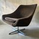Brown vintage armchair/chair on a star base.
