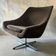 Brown vintage armchair/chair on a star base.