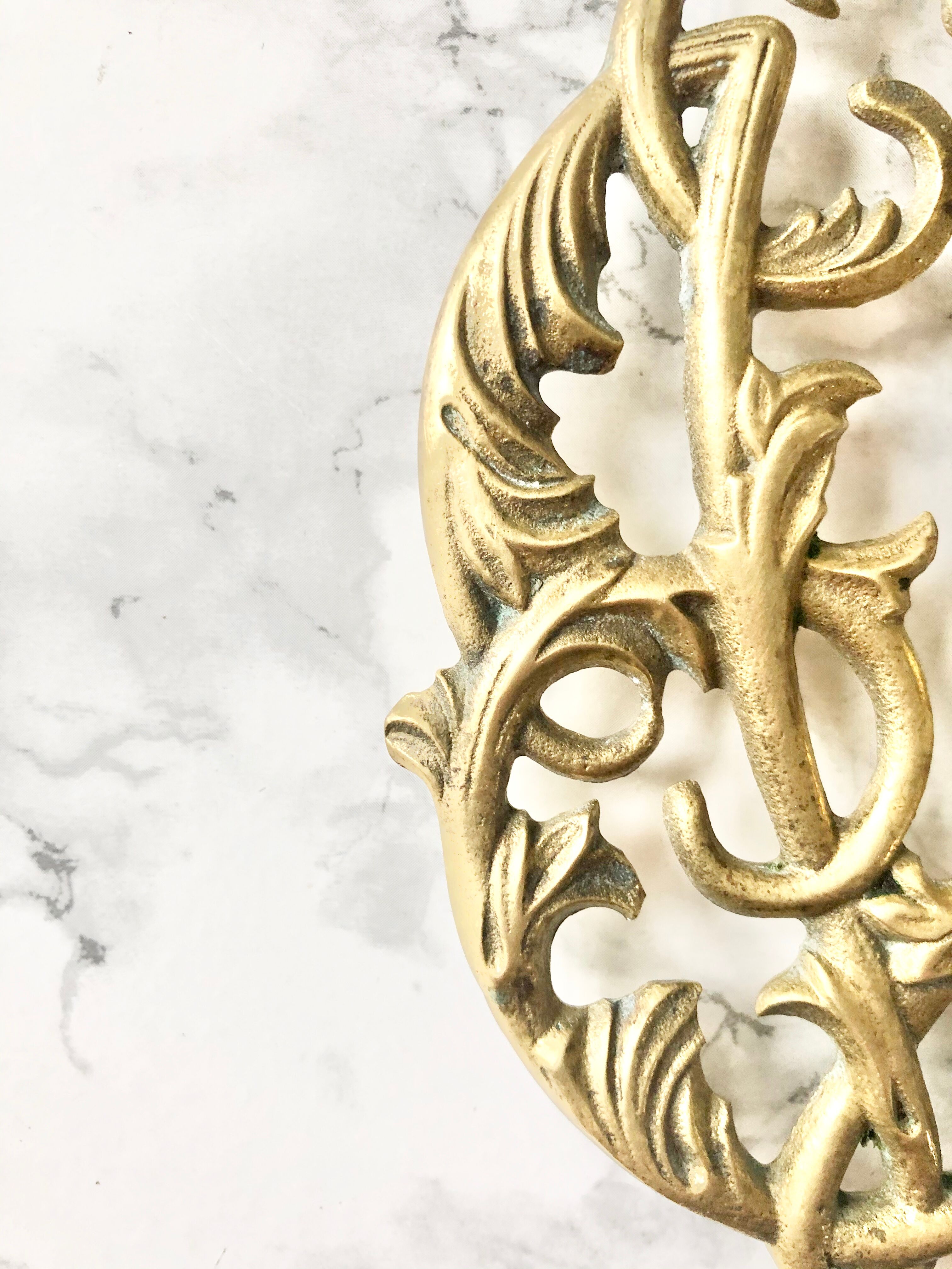 Underside of old solid brass dish, american manufacture Virginia Metalcrafters