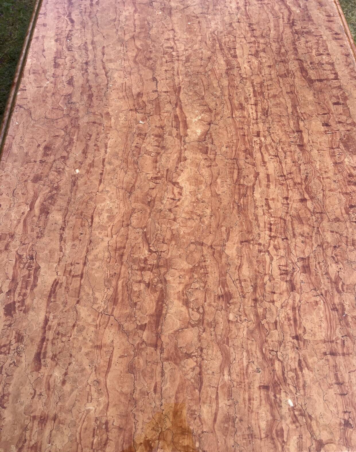 Large dining table in Rosso Alicante marble from the 70s-80s.