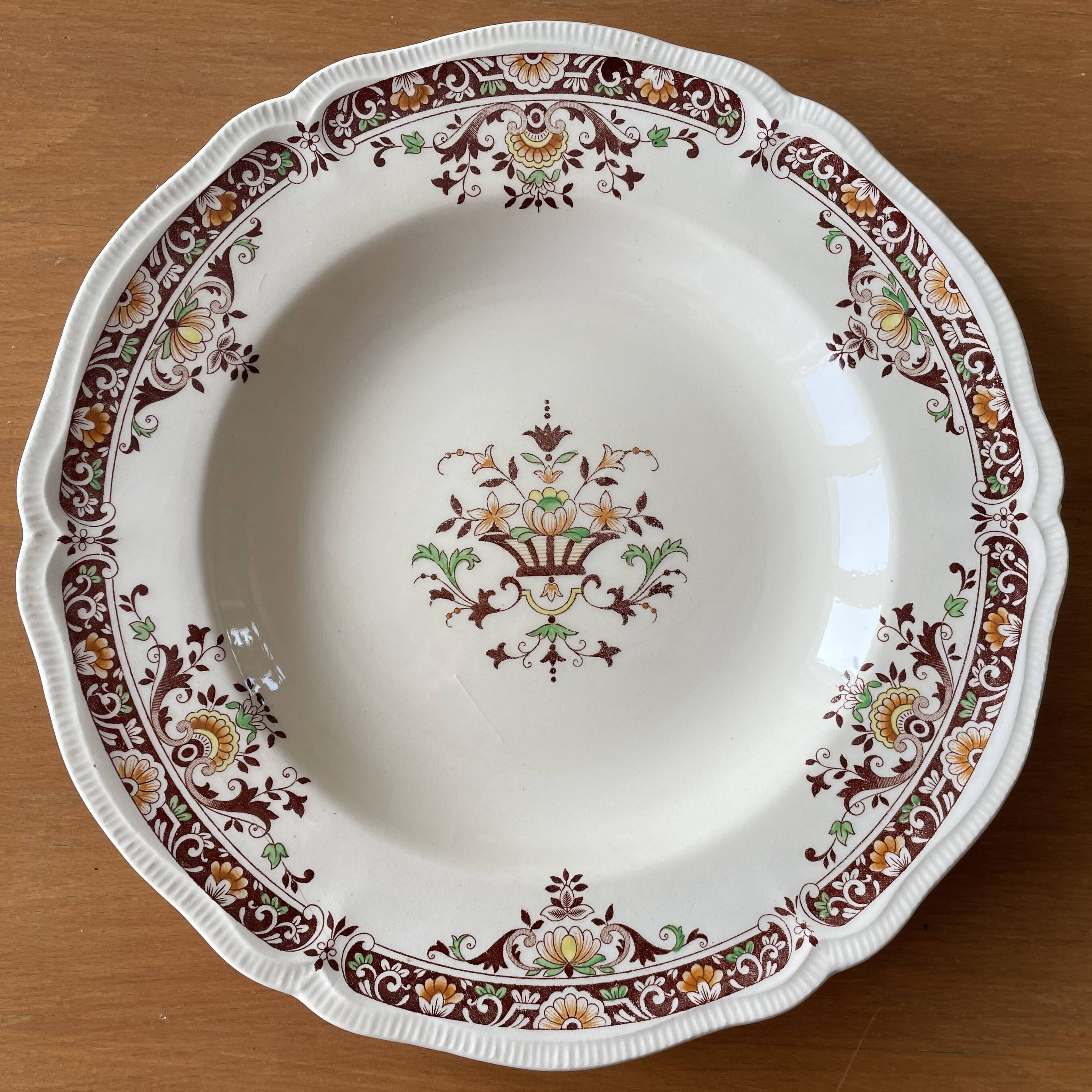 6 antique semi-deep plates in Longchamp earthenware.