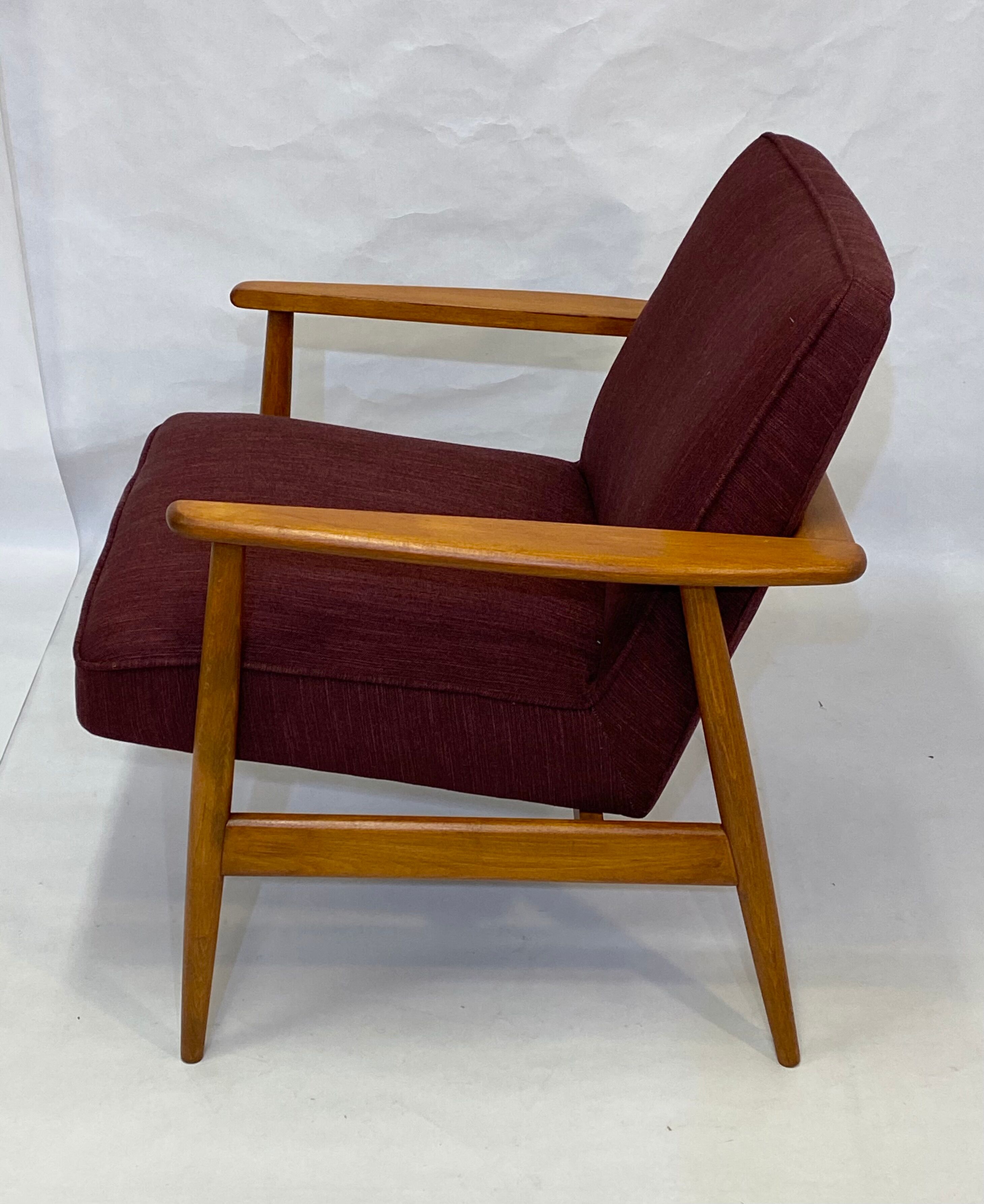 Chair created by Mr. Zieliski year 60 burgundy fabric.