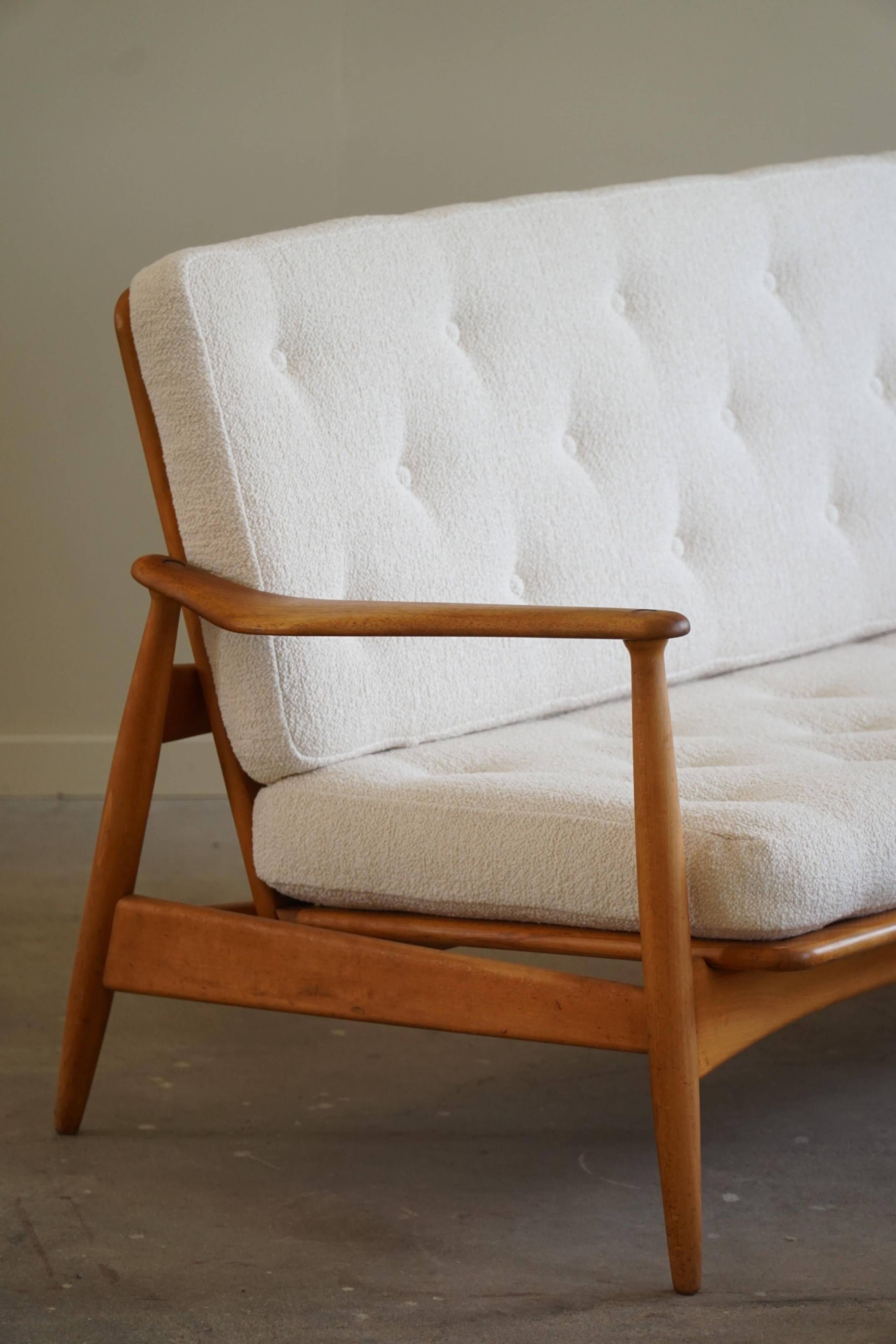 Two-seater canapé Arne Vodder, model Fd 161, reupholstered in boucle, 1950s.