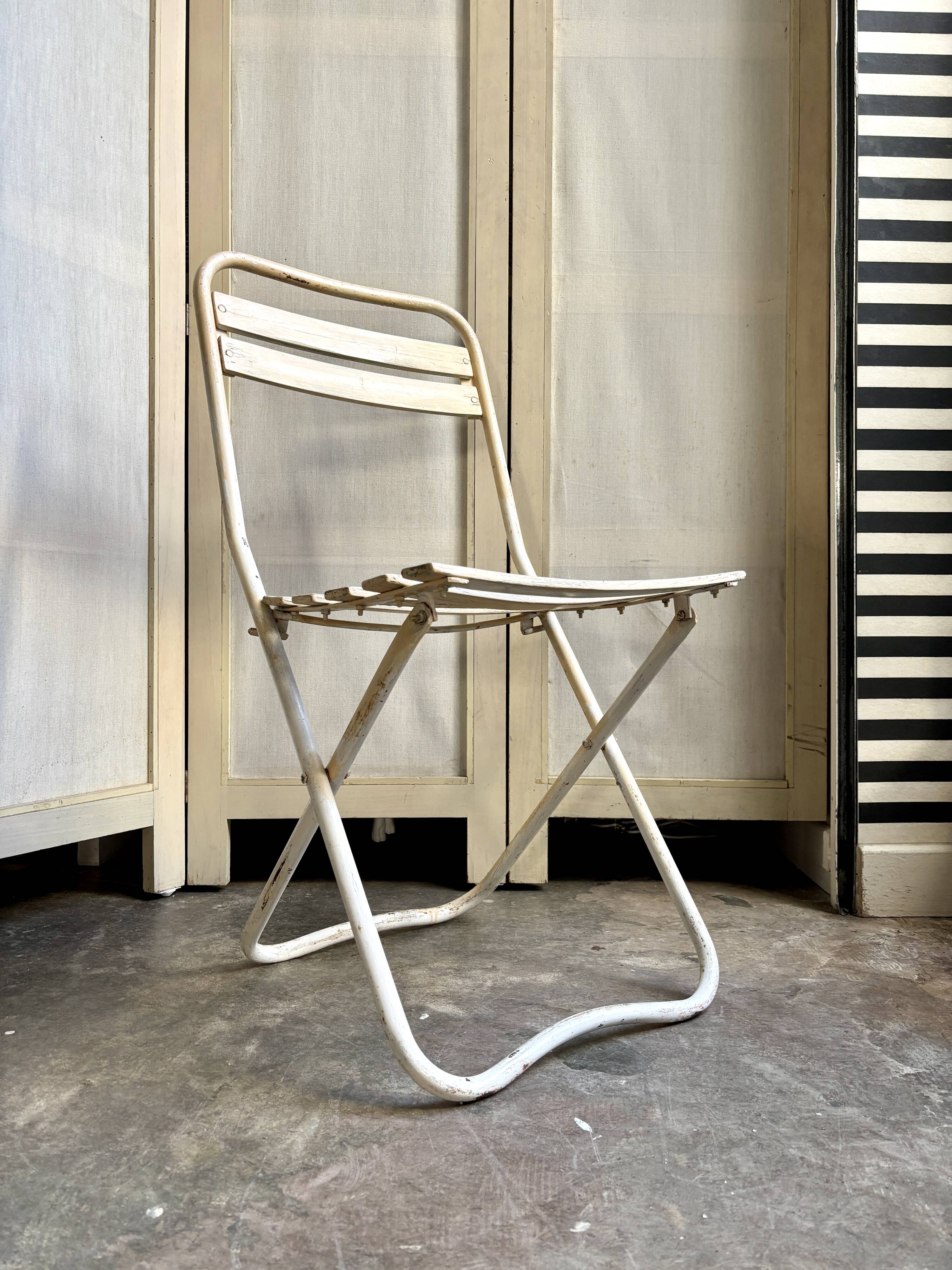 Beige wooden and metal folding chair
