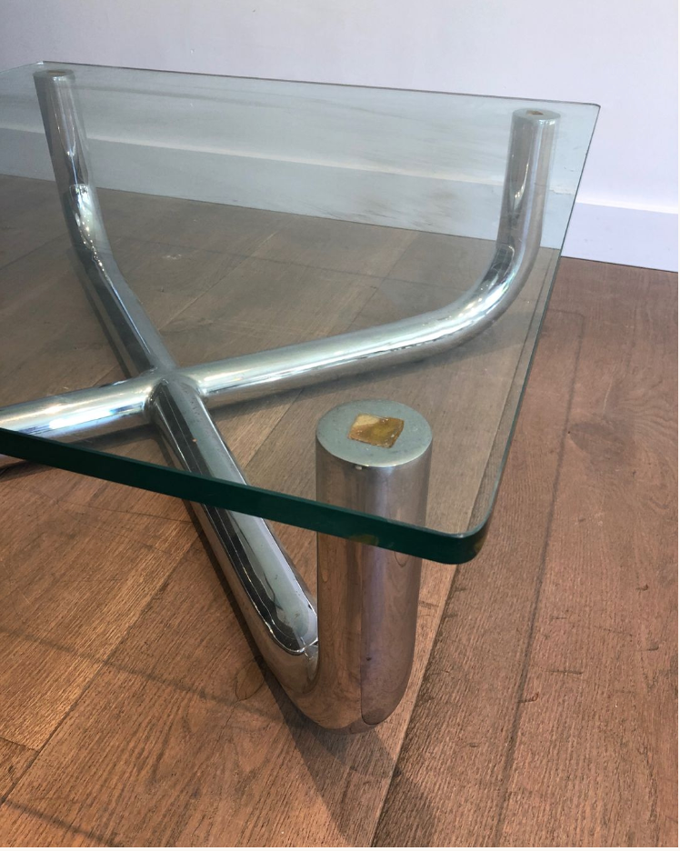 Chrome coffee table with a glass top