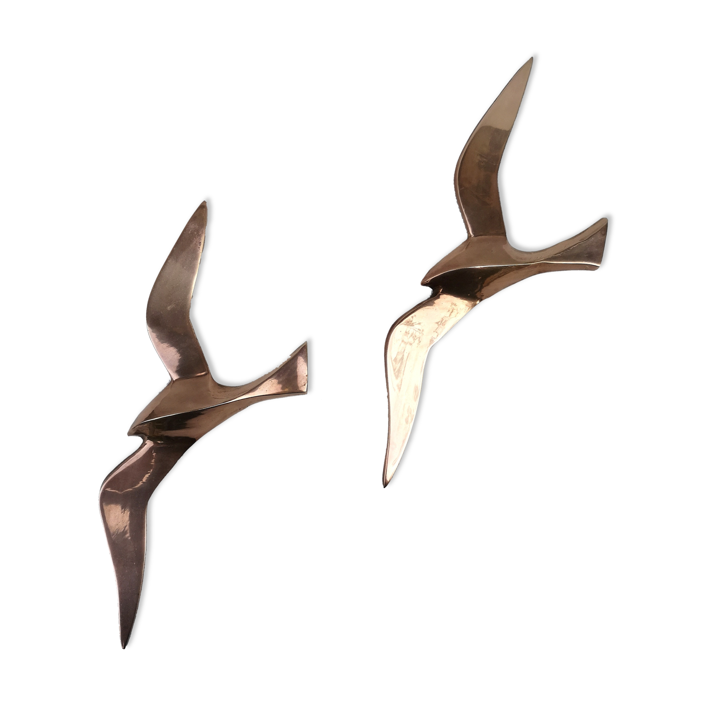 Stylized brass birds