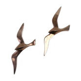 Stylized brass birds