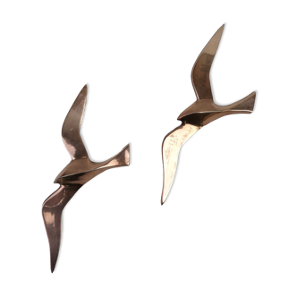 Stylized brass birds