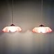 Paire de suspensions festonnées en verre satiné transparent et rose, années 1920-30