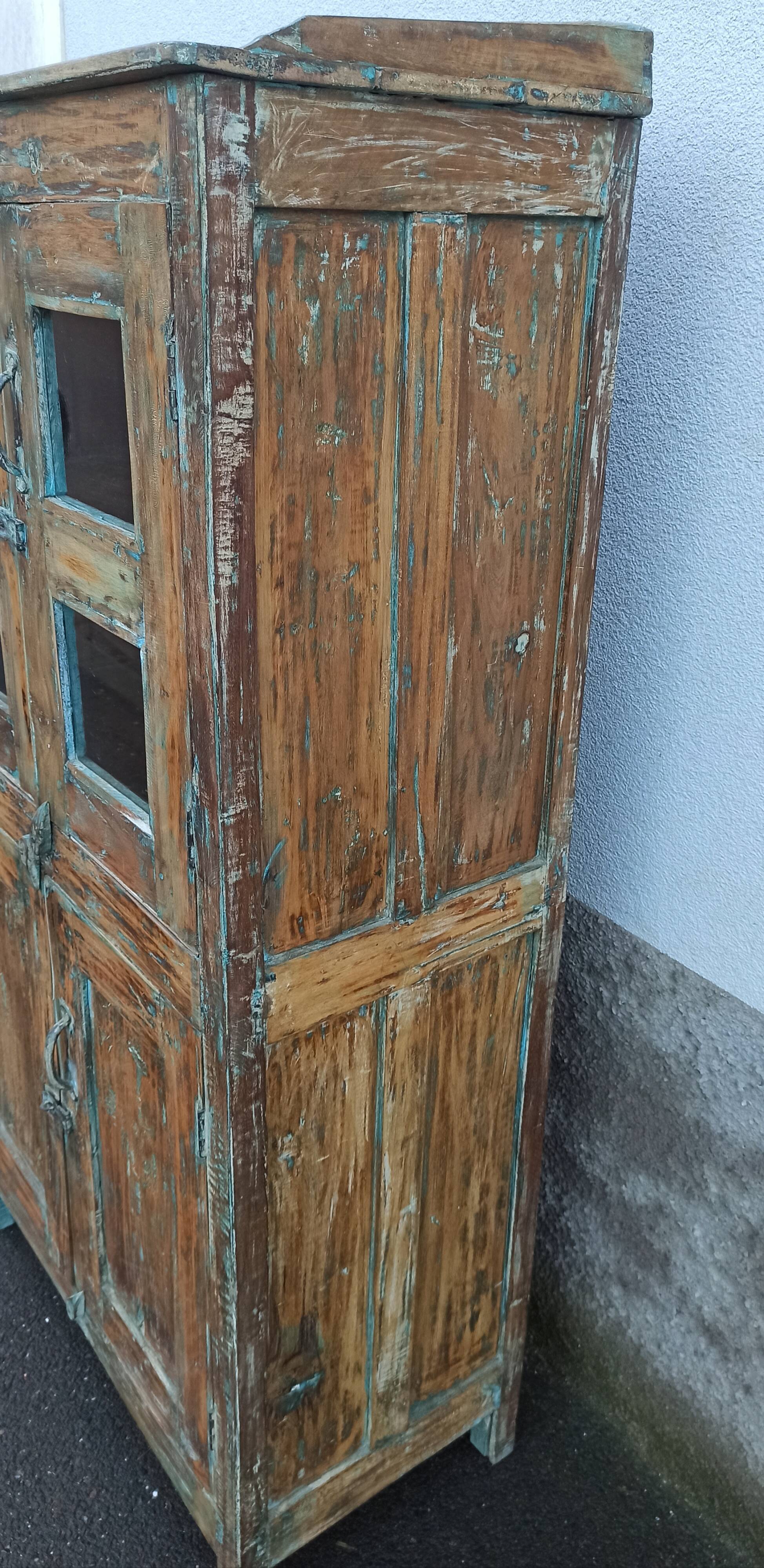 Old wooden cabinet with 4 doors