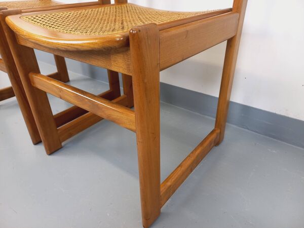 Paire de chaises traîneau vintage en bois de hêtre et cannage des années 70
