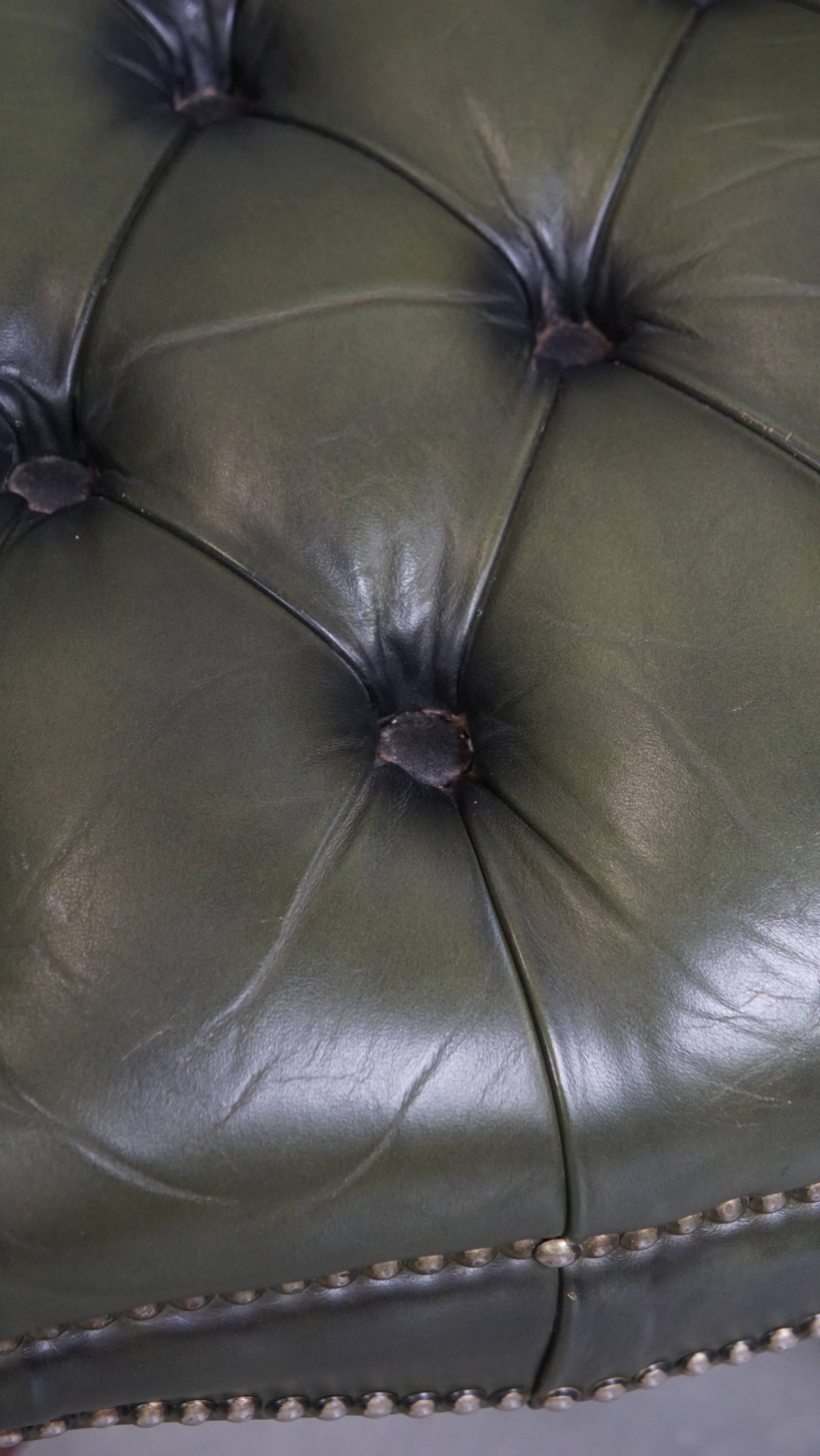 Chesterfield office chair in green cowhide leather on casters with high back