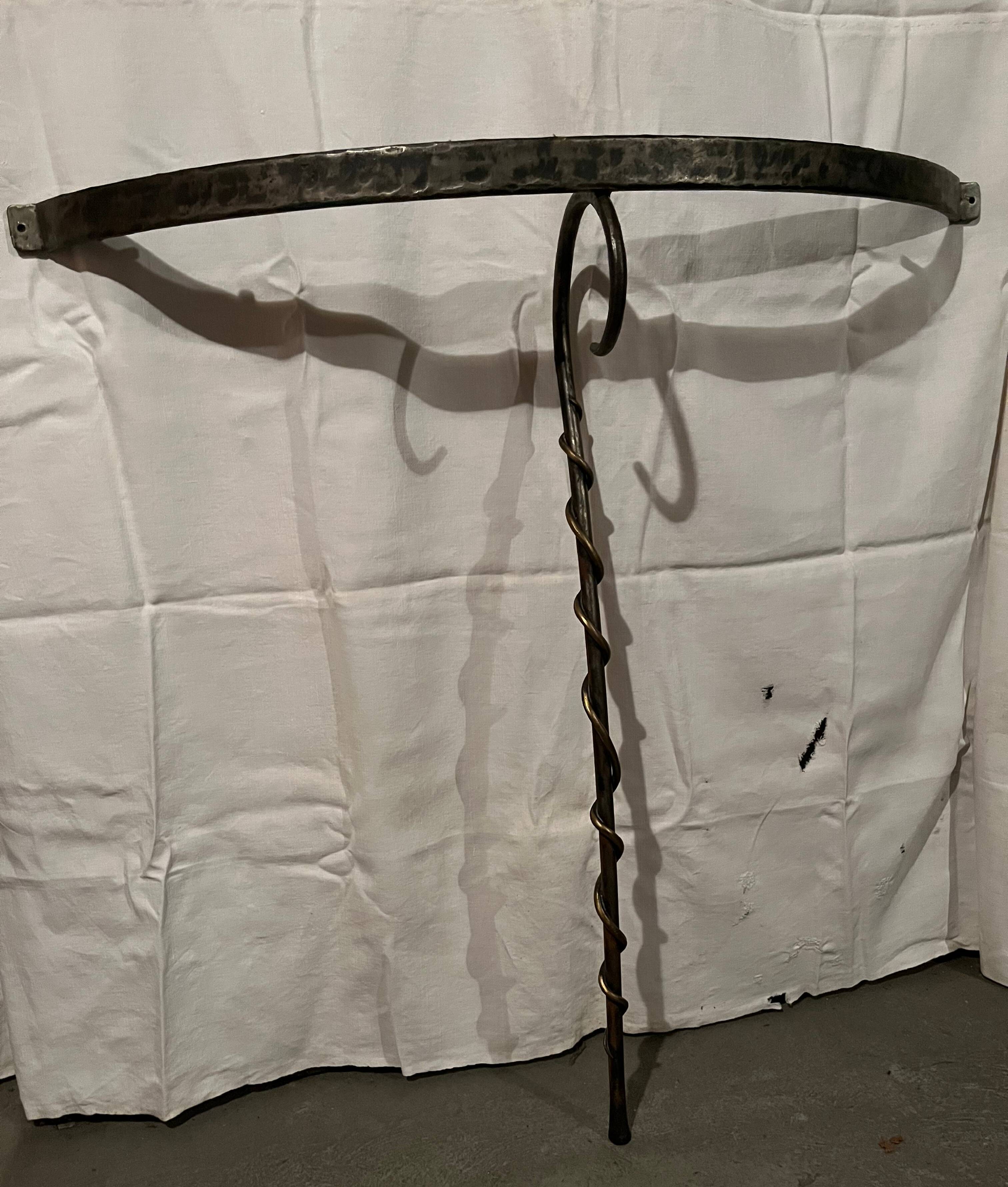 Console design in brushed steel and glass