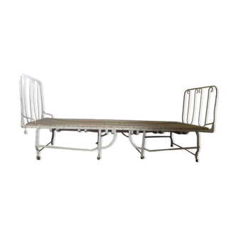 Vintage wrought-iron folding extra bed