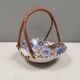 Beautiful small painted ceramic basket with woven handle
