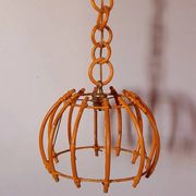 Rattan suspension in the style of Louis Sognot, 1960.