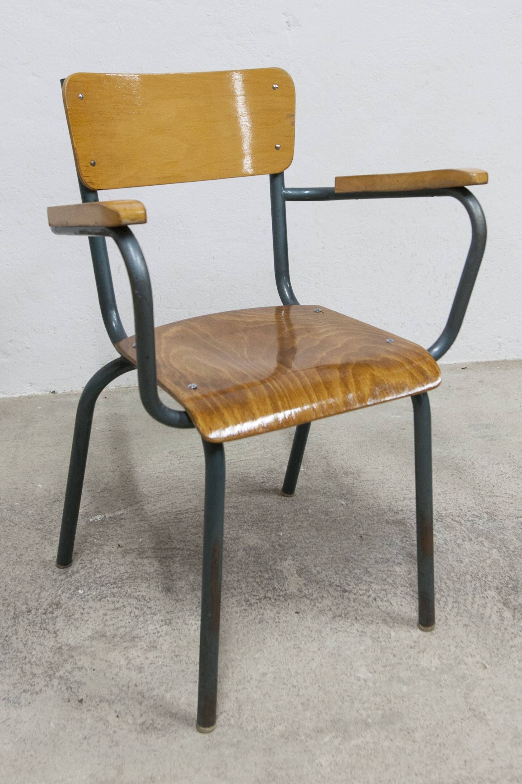 1962 school teacher's chair in honey color and tubular structure