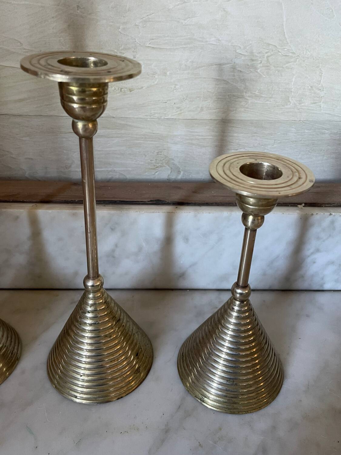 Set of three vintage brass candle holders