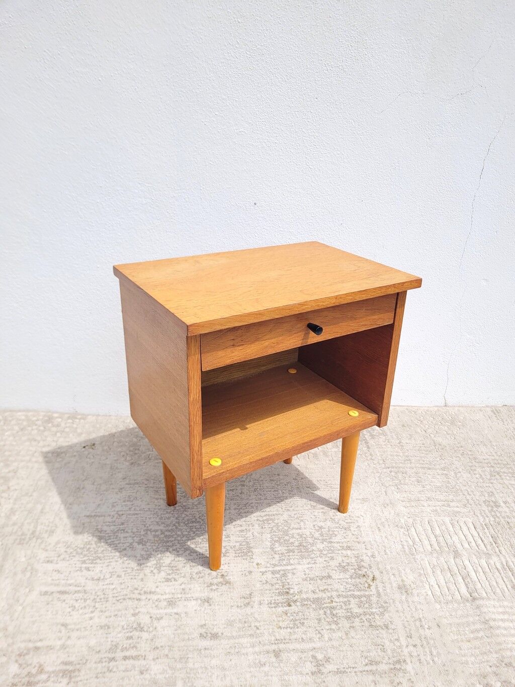 Vintage bedside table from the 60s/70s in wood.