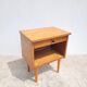 Vintage bedside table from the 60s/70s in wood.