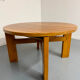 Extendable round table Maison Regain in solid elm, 1970s design.