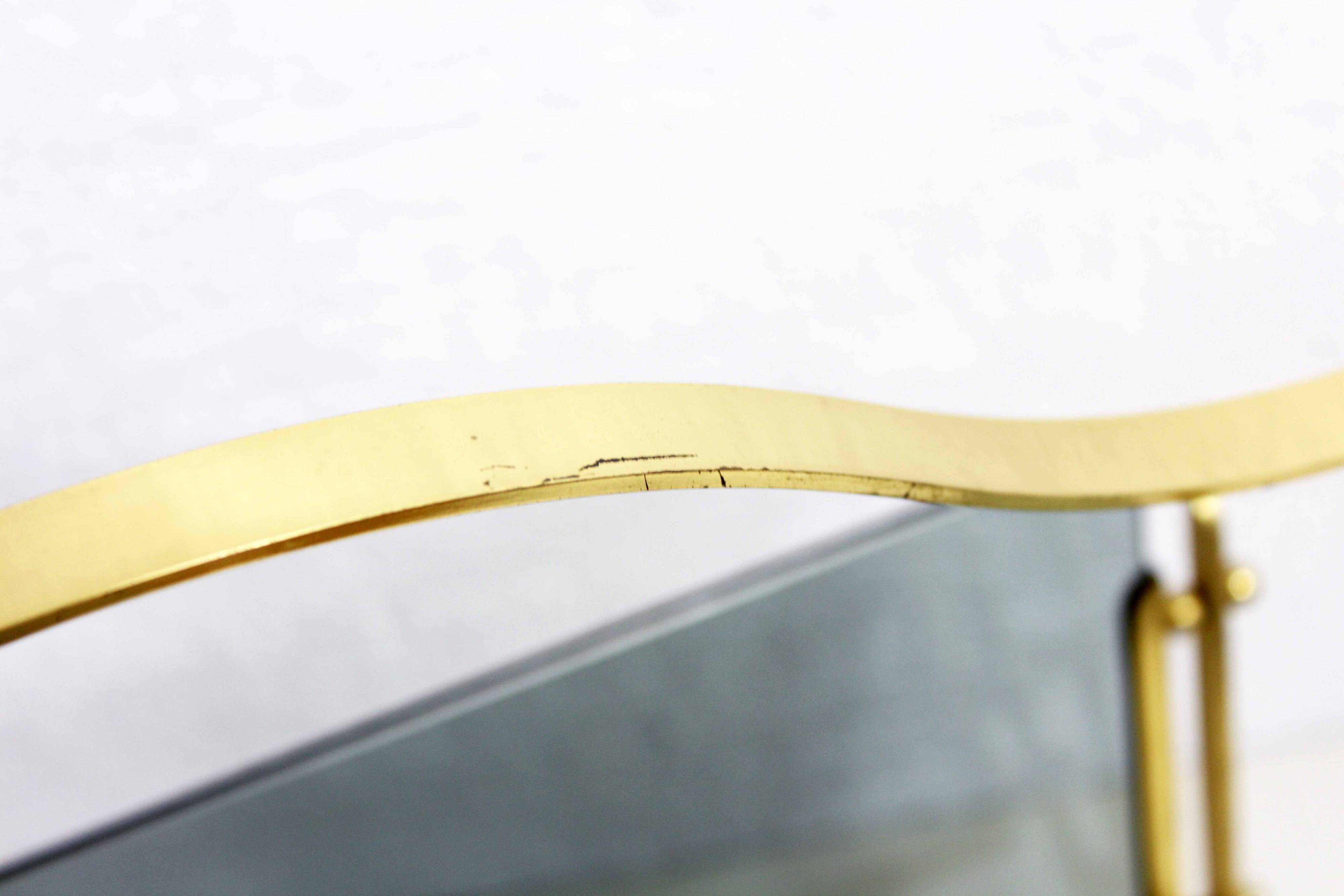 Glass and brass magazine rack, 1970s