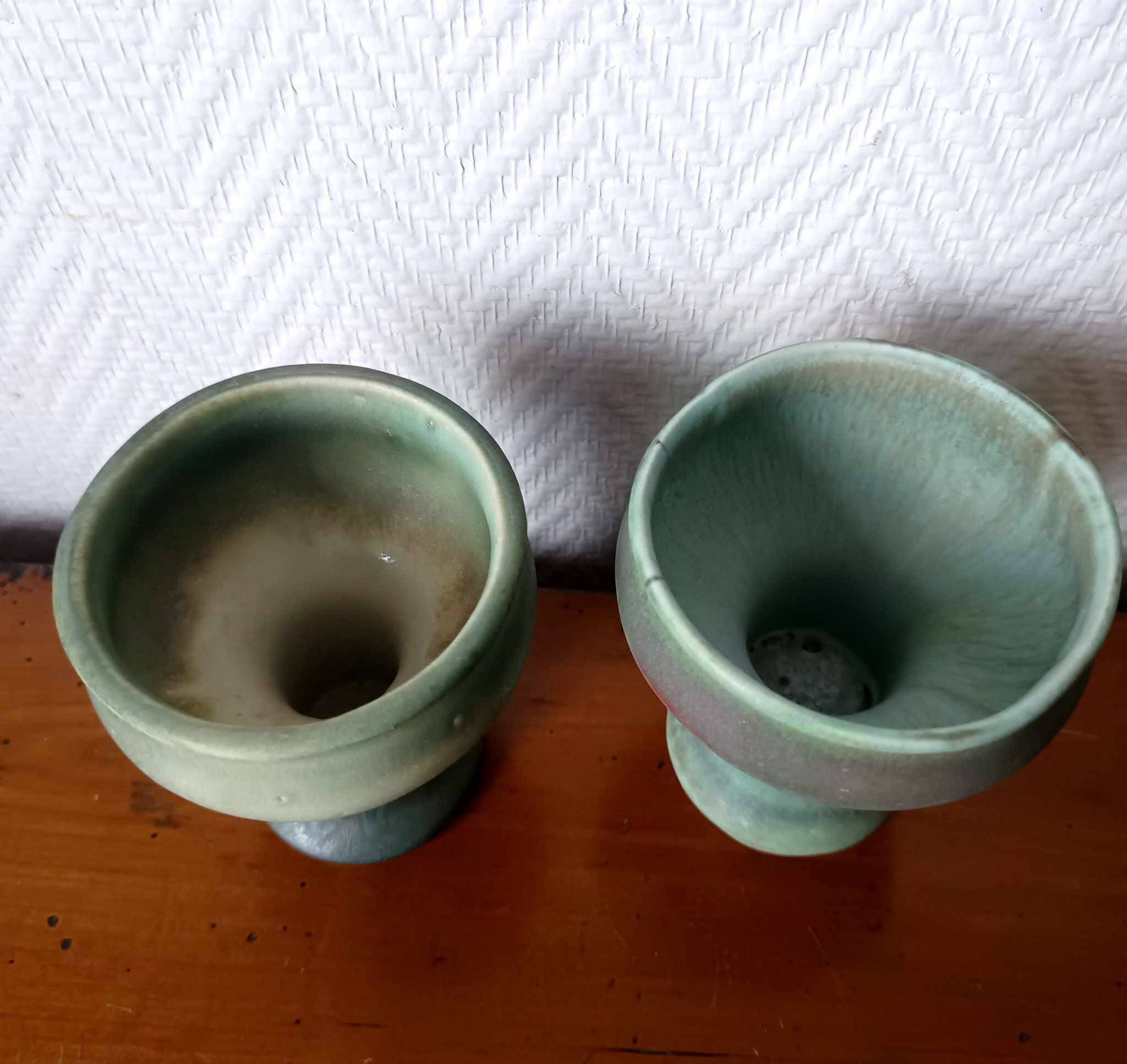 Pair of Belgian ceramic candlesticks on feet