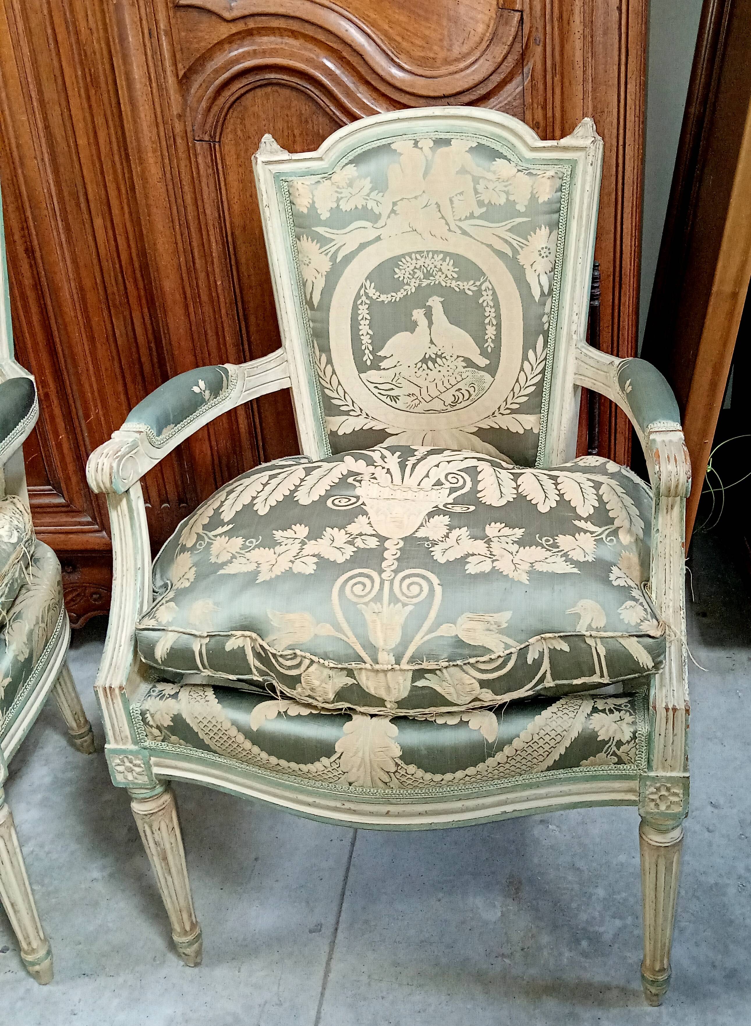 Pair of large Louis XVI armchairs in water green and cream wood.