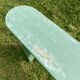 Old curved wooden farm bench