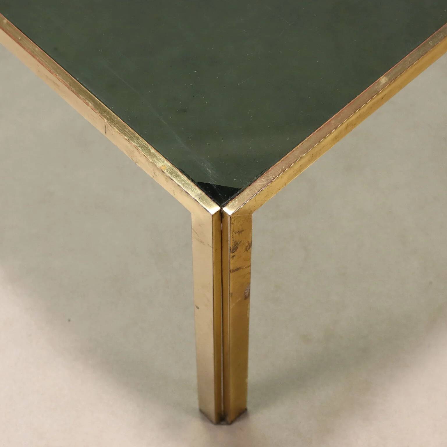 Vintage coffee table in brass and smoked glass, 1970s design.