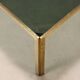 Vintage coffee table in brass and smoked glass, 1970s design.