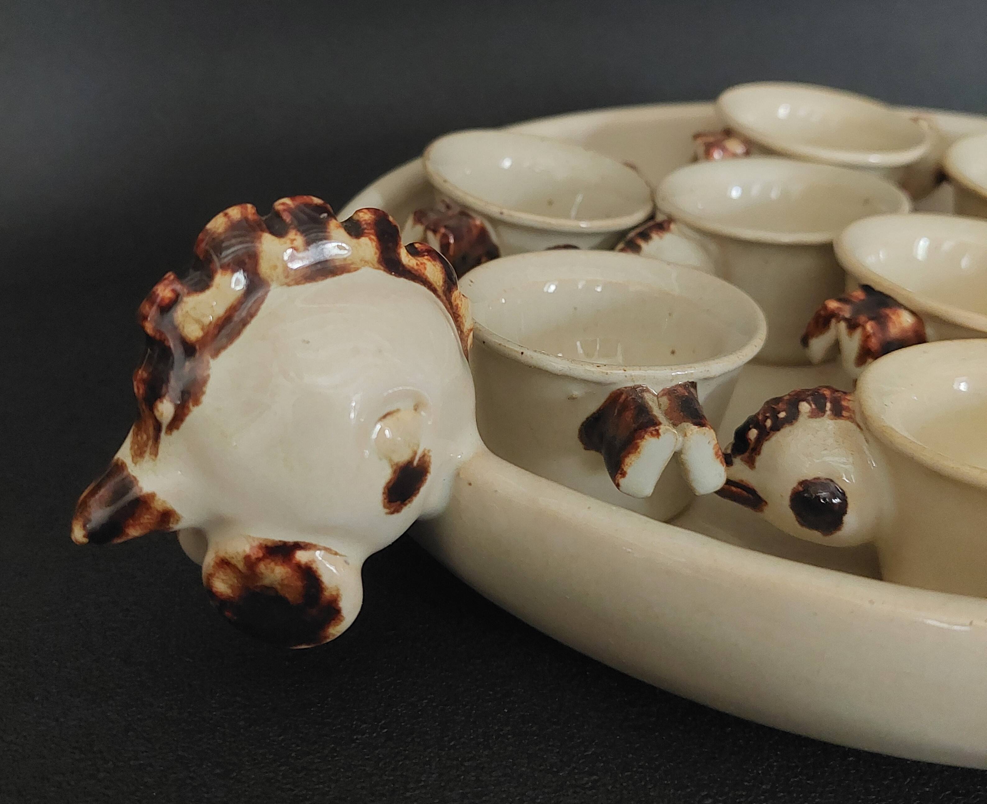 Egg cups with servant, series of eight stoneware signed arts ceram grand feu XX