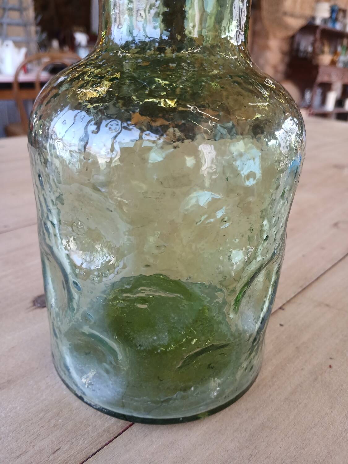 Antique green carafe