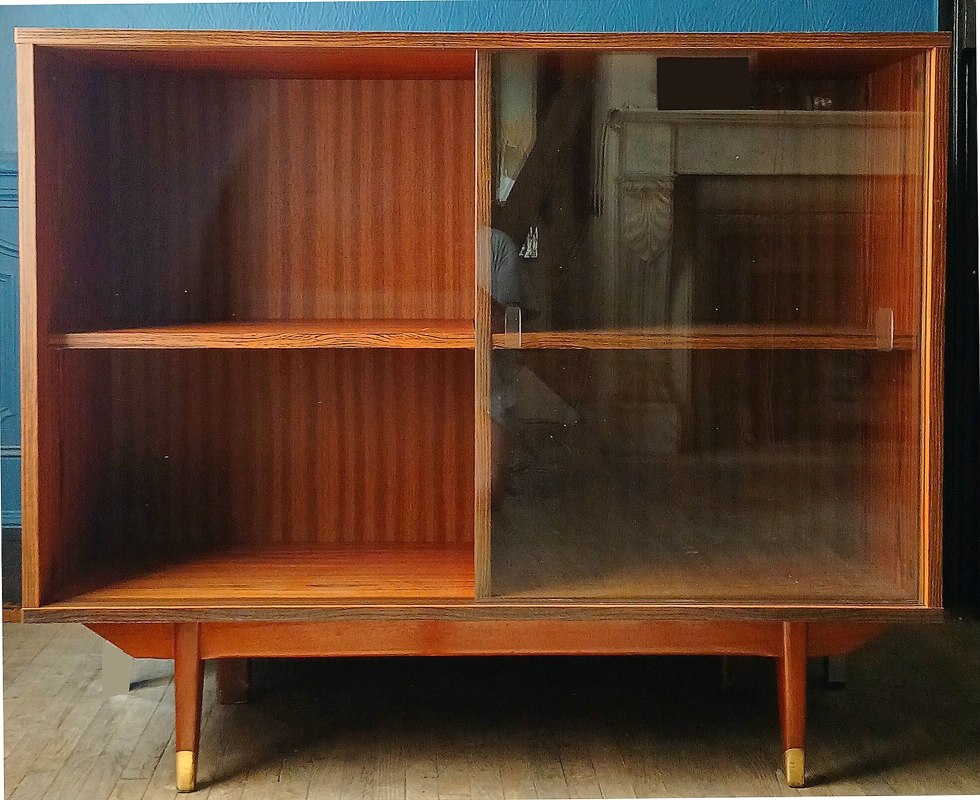 Enfilade wall vitrine in veneered teak from the 1960s.