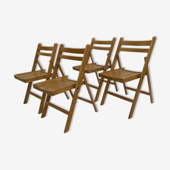 Ensemble de quatre chaises pliantes en bois vintage design design années 60