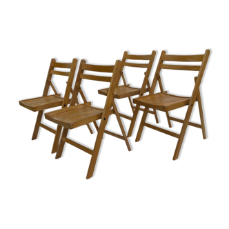 Ensemble de quatre chaises pliantes en bois vintage design design années 60