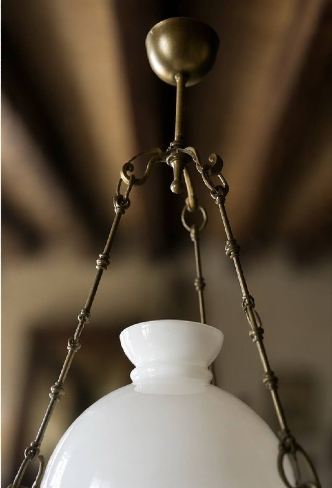 Antique Napoleon III suspension in brass, wood, and opaline glass.