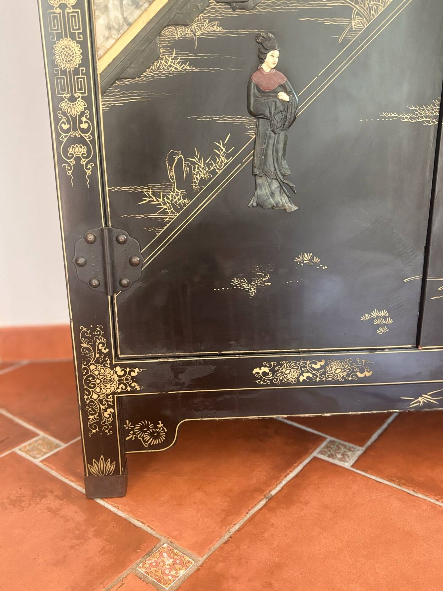 Magnificent black and gold lacquered Chinese cabinet.