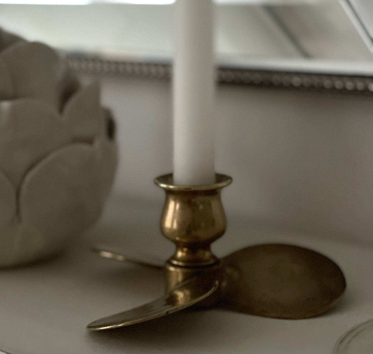 Propeller candle holder in solid brass