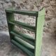 Vintage open pine shelf, original sage green paint, circa 1900–1930.
