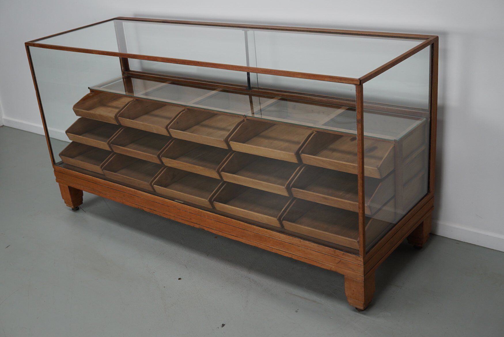 Antique British oak haberdashery cabinet, 1930s