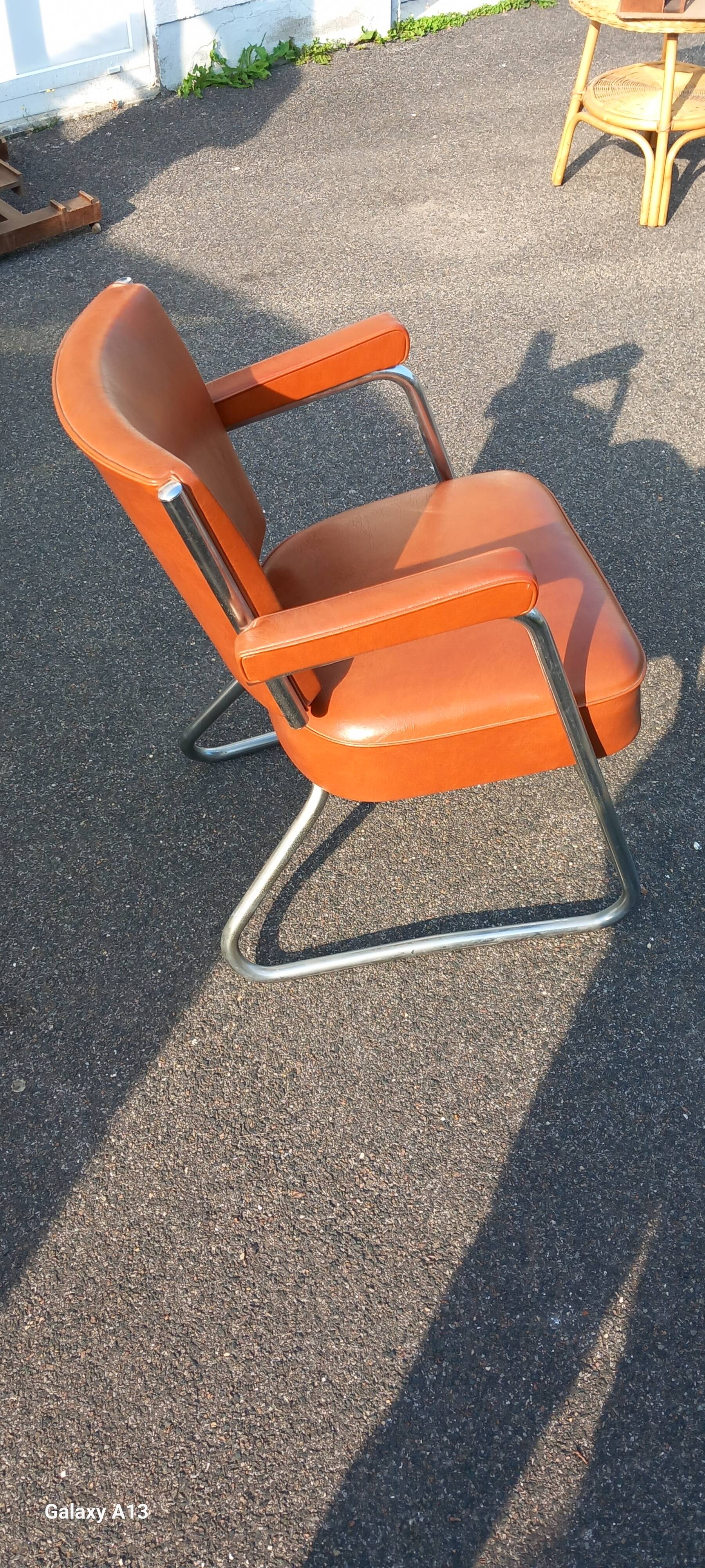 Vintage leatherette and chrome armchair