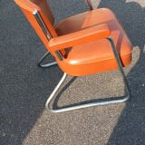 Vintage leatherette and chrome armchair
