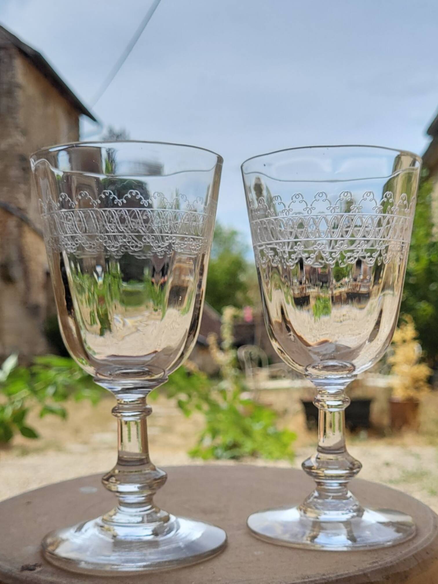 6 engraved glass wine/water glasses from the early 20th century.
