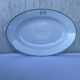 Antique oval plate with green monogram