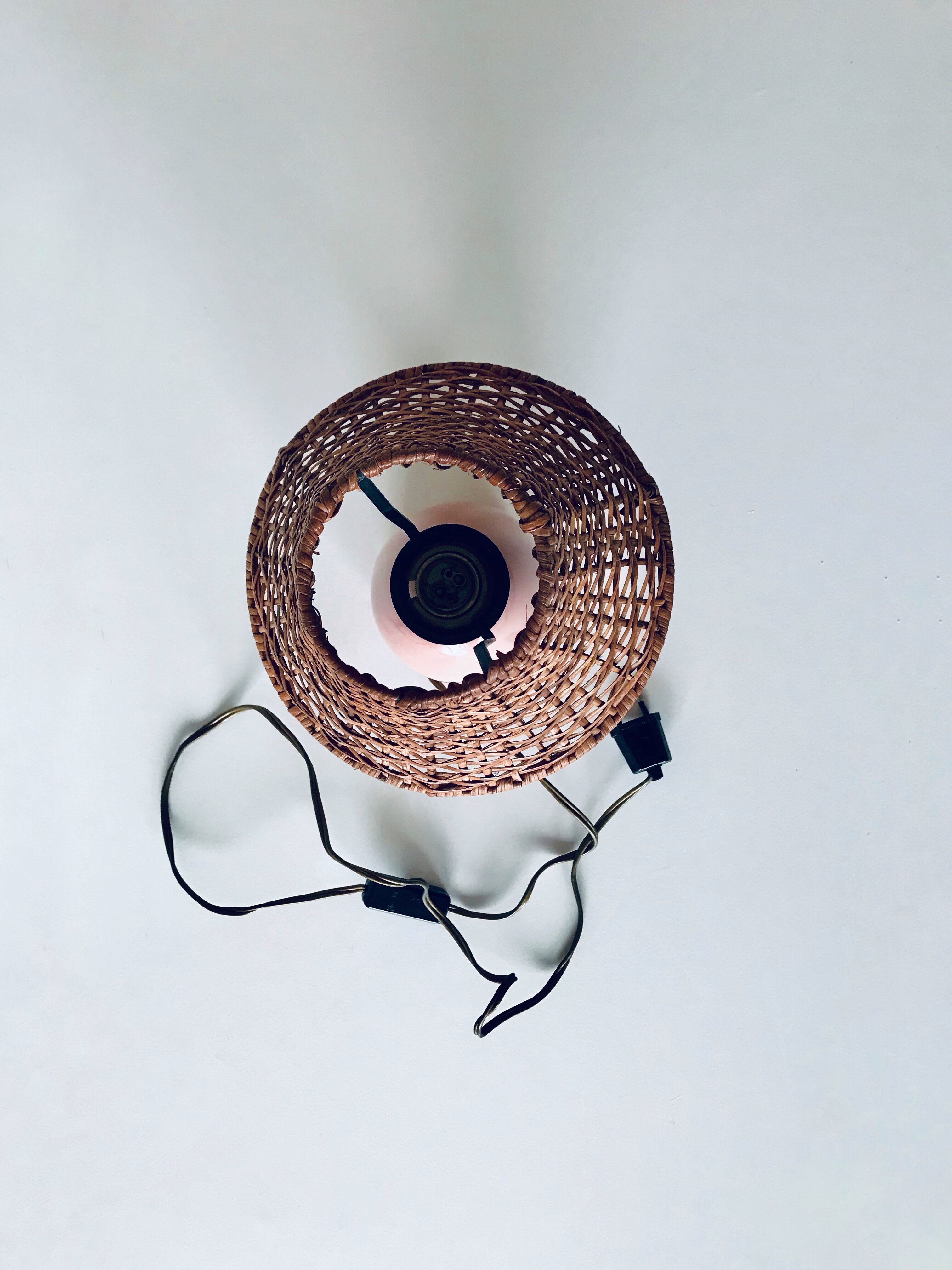 Pink rattan lamp