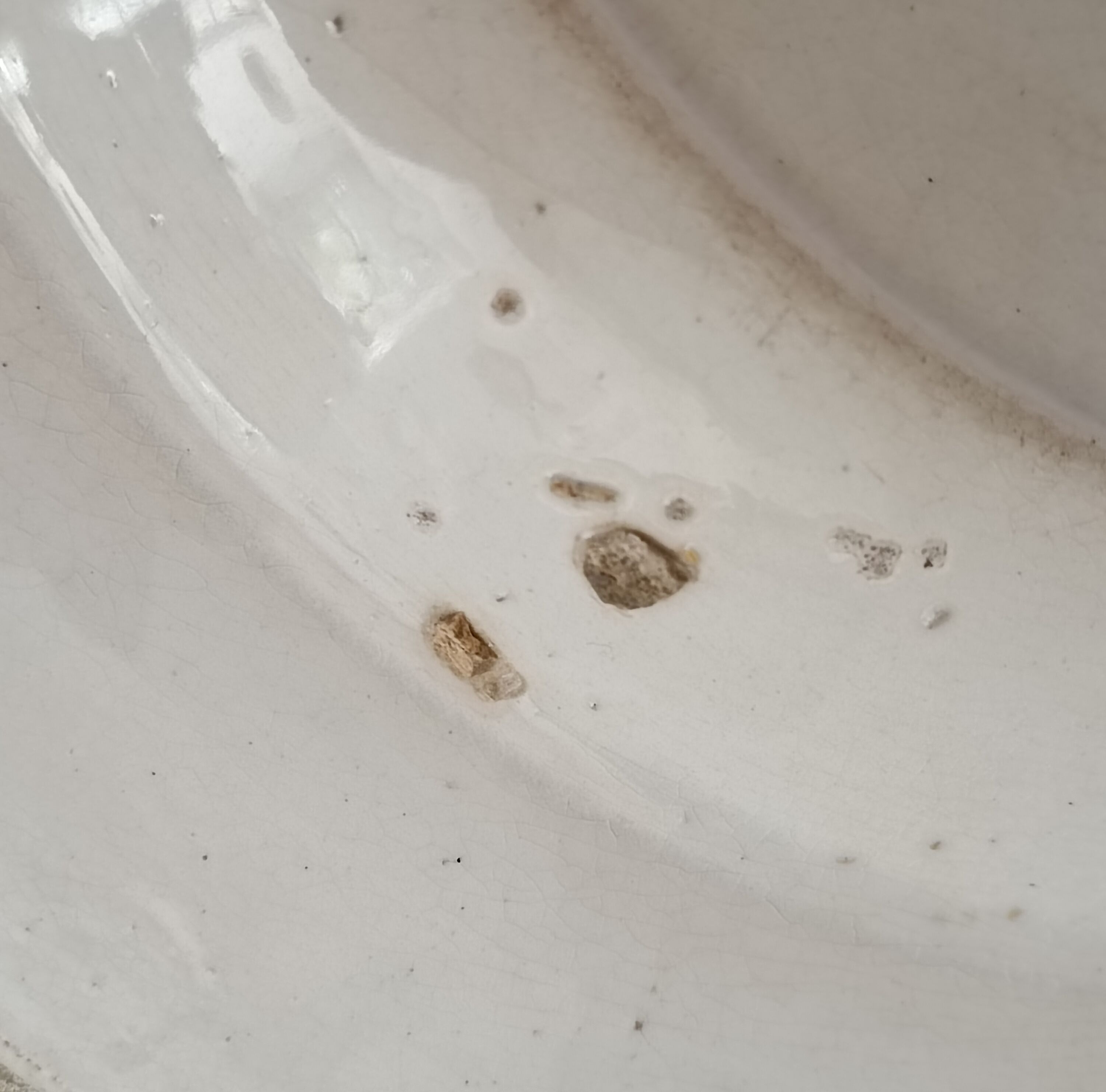 Serving dish iron earth decorated with child and stork decoration