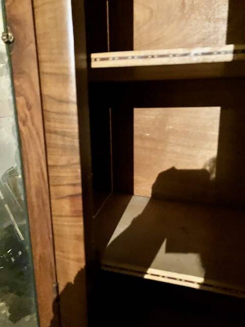 Old black marble chest of drawers