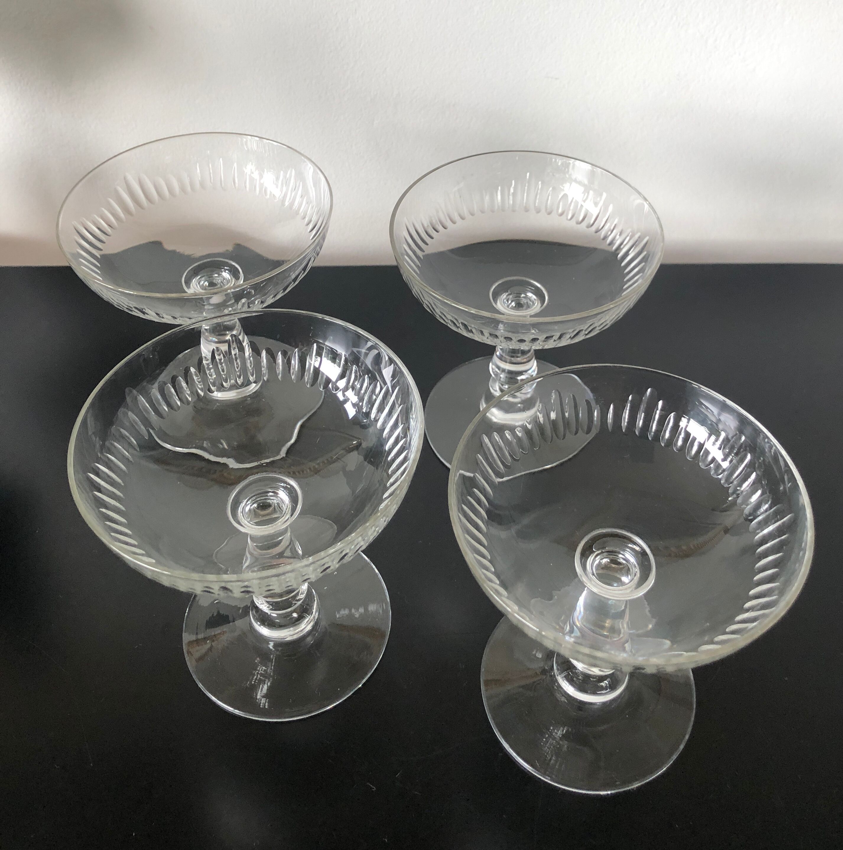 4 glasses of carved crystal champagne